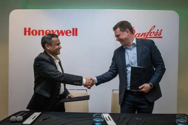 L-R Pramesh Maheshwari, President of Honeywell Process Solutions and Mika Kulju, President, Danfoss Power Electronics and Drives Segment